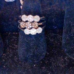 Three diamond rings one is a champagne diamond